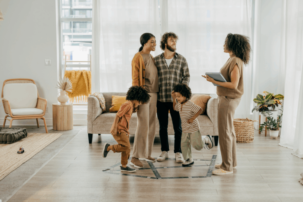 Family in their home going over paperwork to sell


