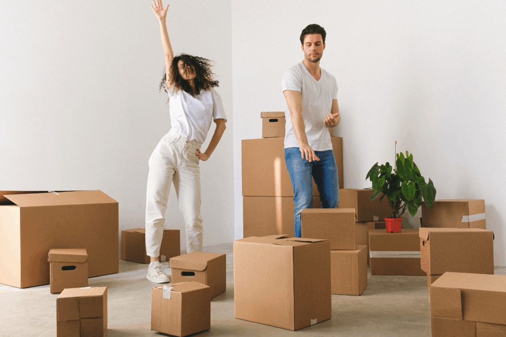 Happy couple packing their home and ready to move