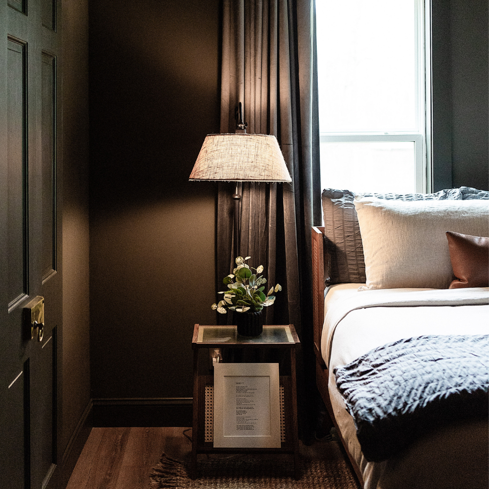 cozy bedroom with linen light and mid-century styled furniture