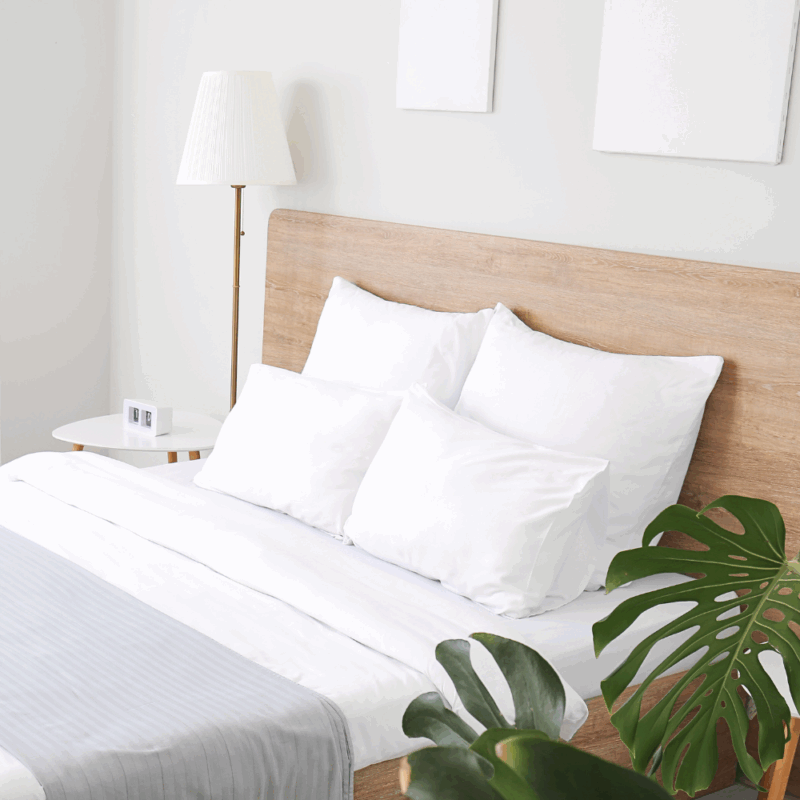 home renovation decisions luxury bedroom with white linens
