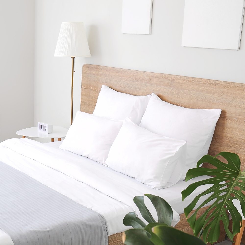 home renovation decisions luxury bedroom with white linens