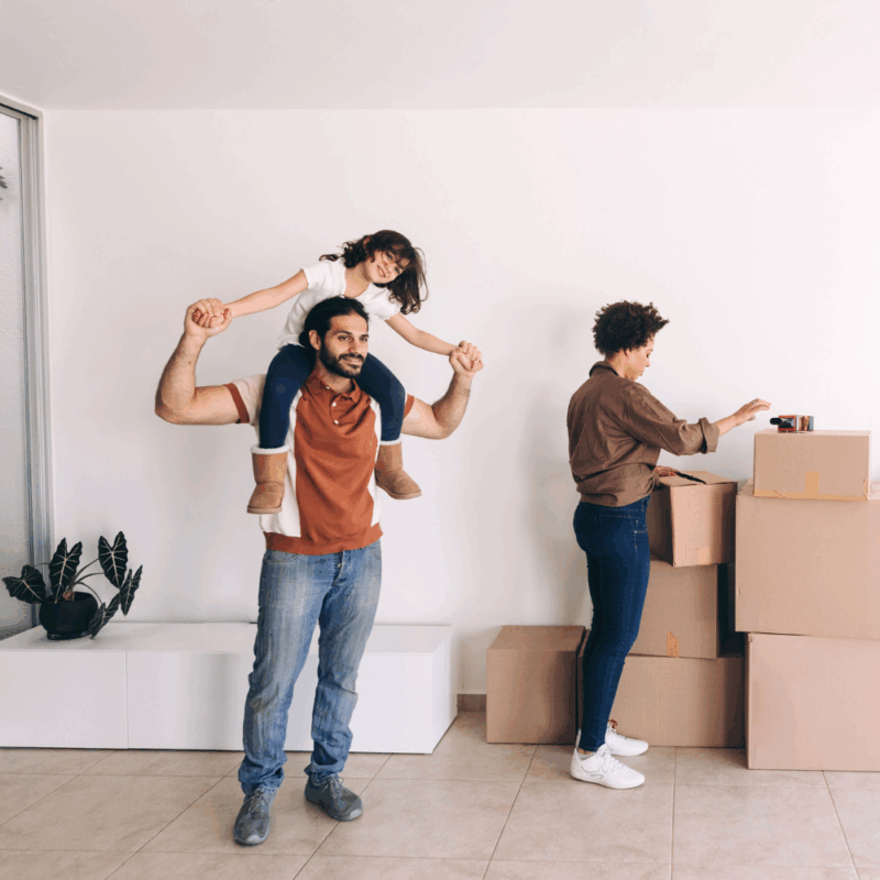 Family packing moving boxes, relocation, North Augusta SC